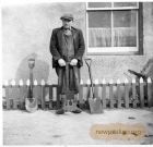 Robbie Wisely holding a peat spad (spade)