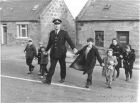 Crossing the road to go to School with the local &quot;Bobby&quot; It probably dates from 1967.